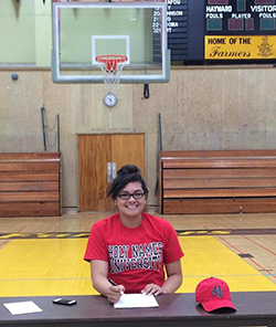 Angela Reid signing with Holy Names